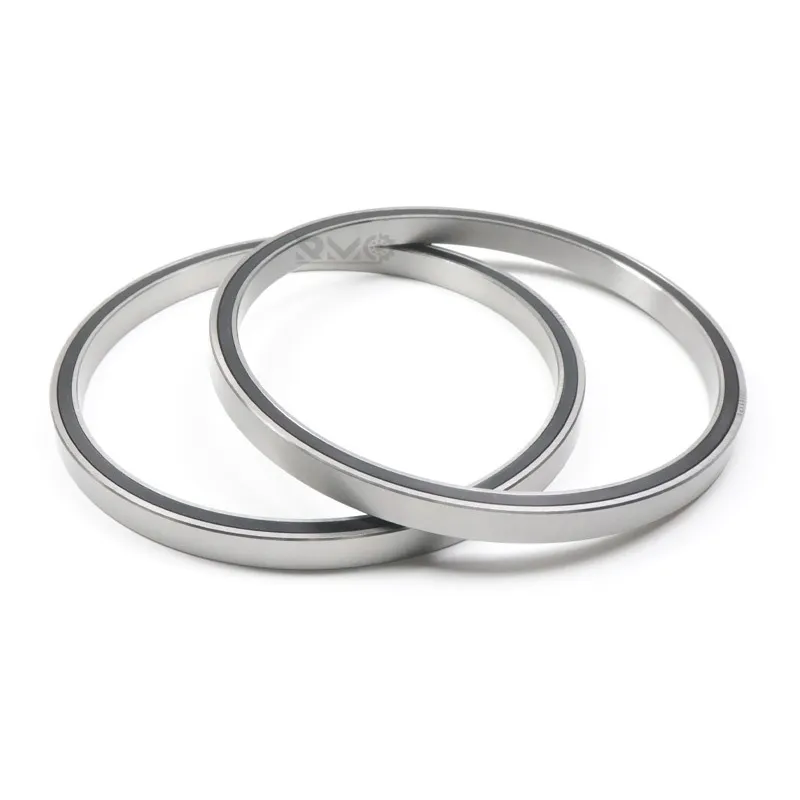 JU065XPO four point contact bearing installed inside an industrial robot articulation joint