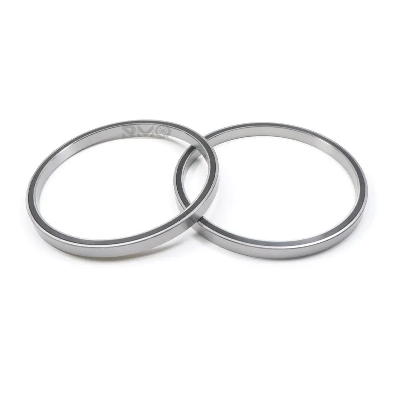 Side by side view of JU065XPO open type and CSXU065-2RS rubber sealed thin section bearings