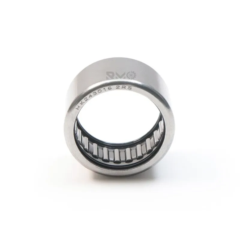 Close-up of thin-walled steel outer cup and needle rollers in HK2416 bearing